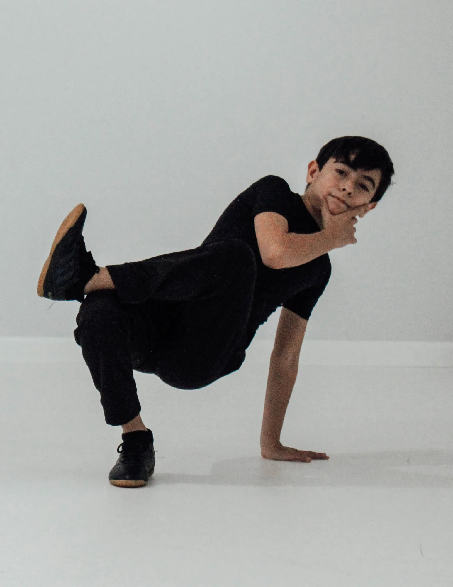 young-beautiful-modern-style-dancer-posing-on-a-studio-background-1 (1)